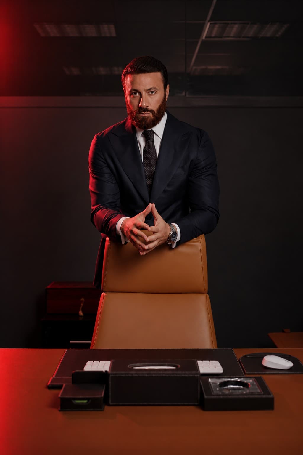 Samir Jezzini standing behind his desk